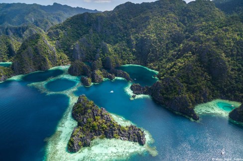 Twin Lagoon in Coron, Palawan, Philippines. Mountain and Sea. Lonely Boat. Tour A.