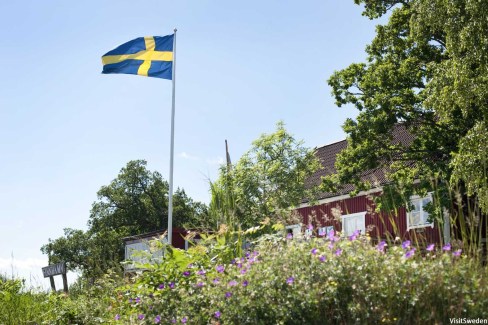 Maison typique et drapeau suédois
