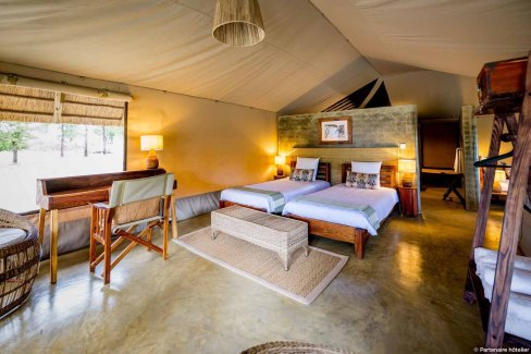 Chambre tout confort d'un tented lodge dans le parc du Serengeti